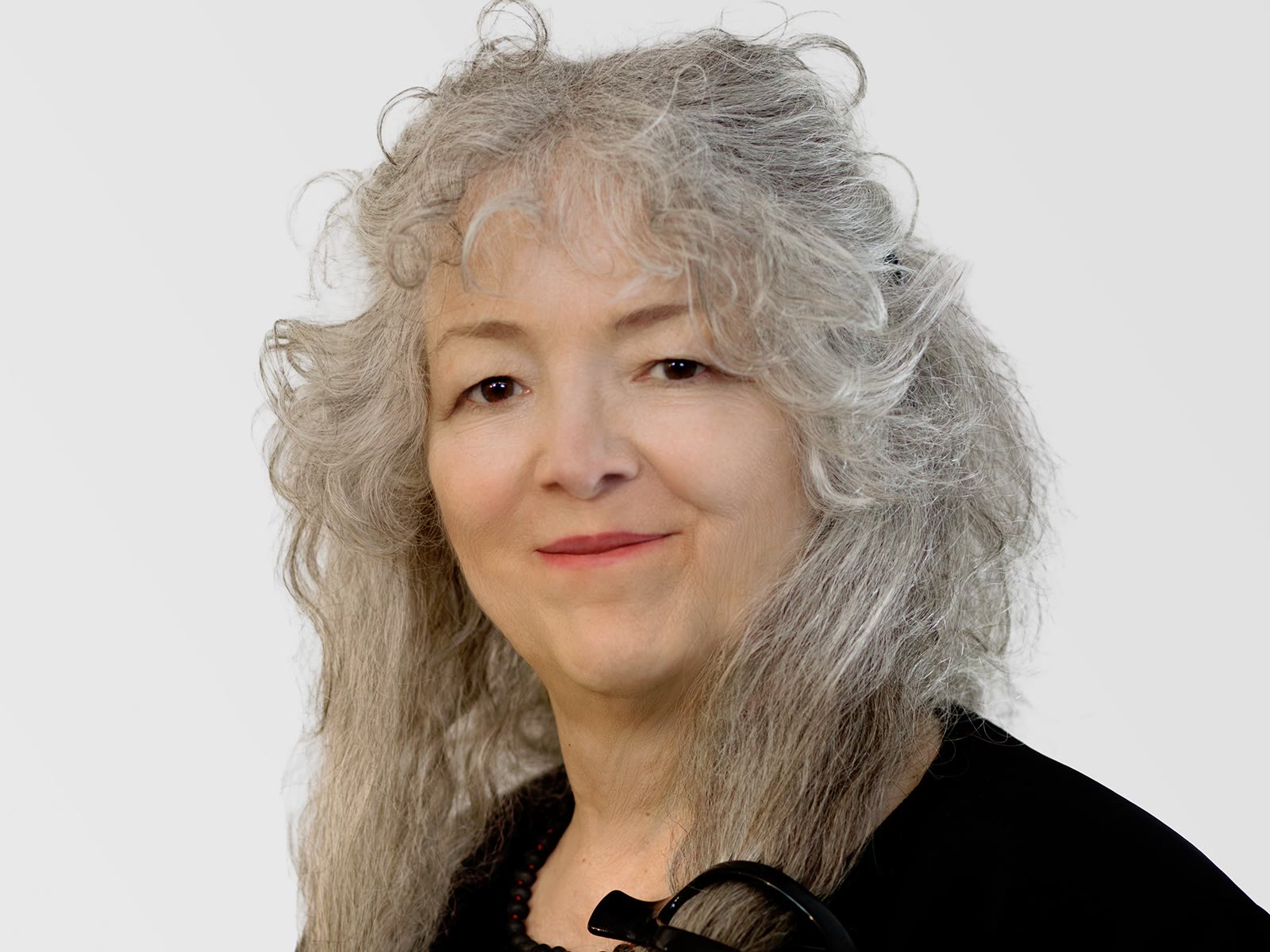 Dr. Irene Grant smiling in a studio portrait